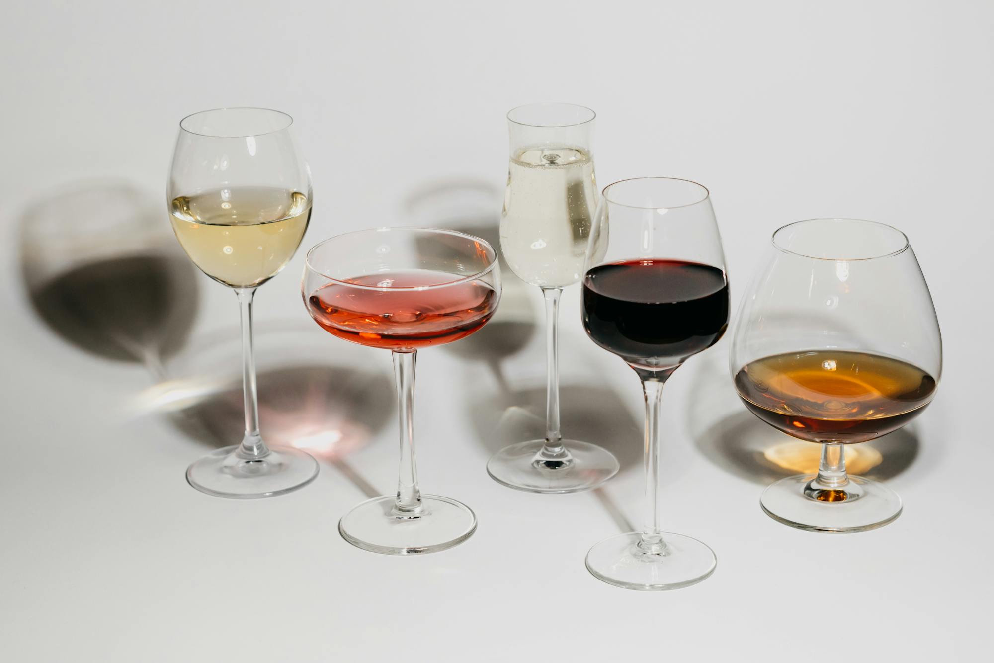 Close-up of wine glasses in professional setting